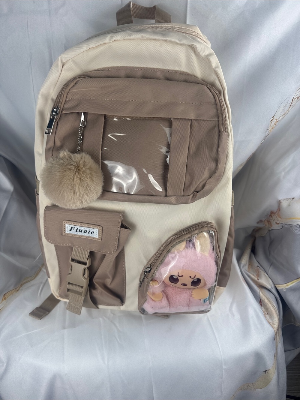 Kids Cream & Taupe Backpack with Pom Pom Charm